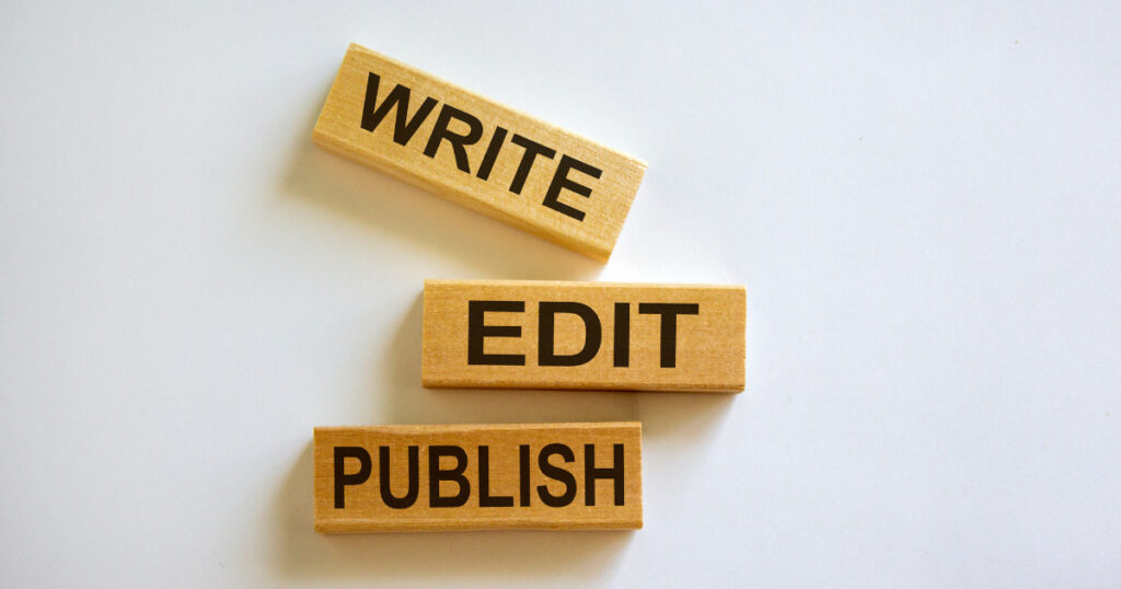 book producer - blocks with the words write, edit, publish stemped on them. 